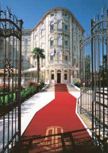 The entrance of the Grande Albergo Ausonia & Hungaria at the Venice Lido with the wrought iron gates of Fucina Artistica Boranga opened